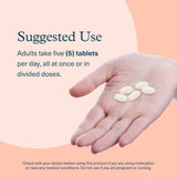 Youtheory Marine Collagen Tablets 2500mg with a glass of water
