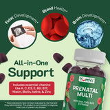 YUM-V'S Prenatal Gummies with fresh berries on a wooden table