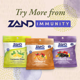 ZAND daily wellness Orange C Lozenges displayed on a wooden table