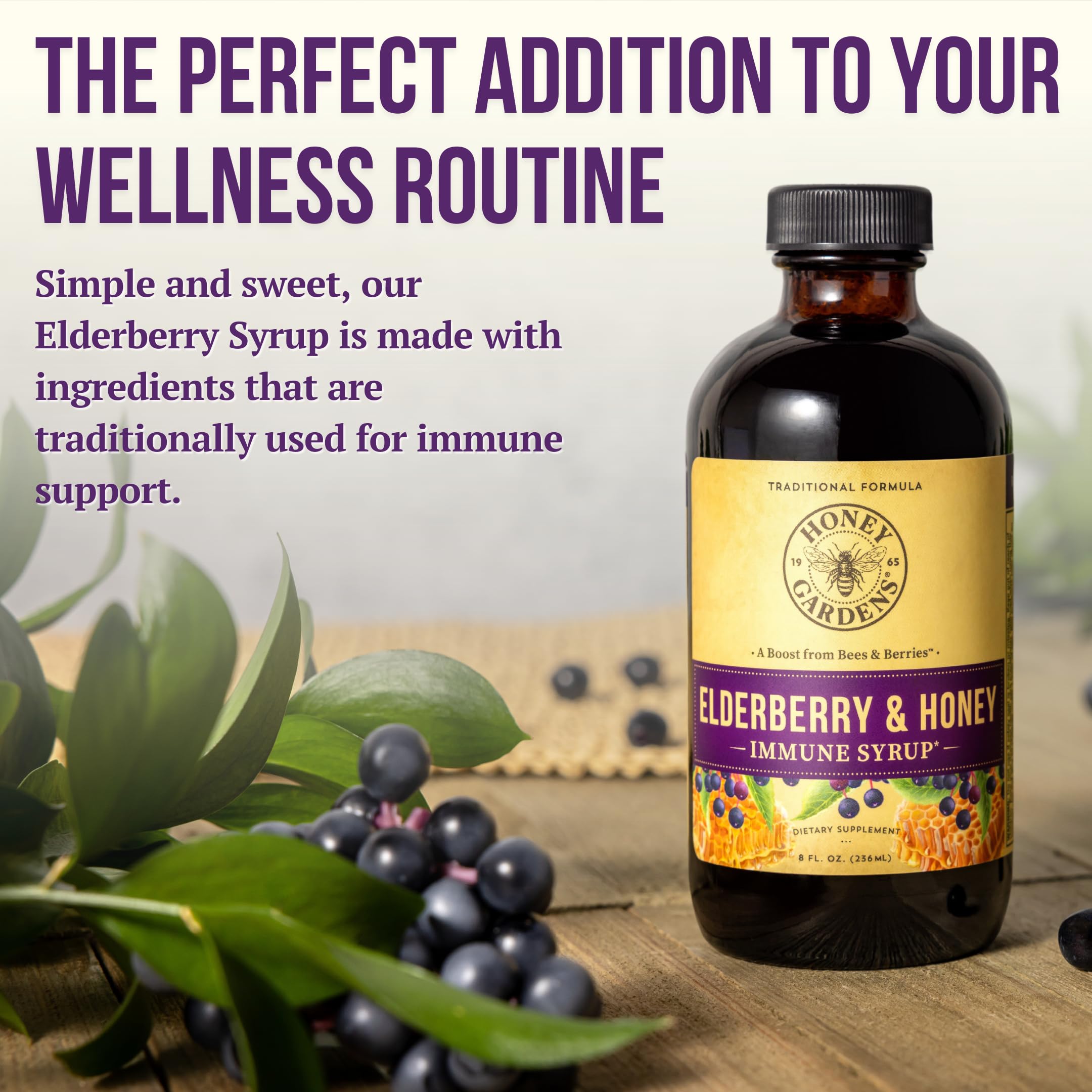 ZAND Elderberry Syrup 481g in a lifestyle setting with tea