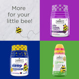 Zarbee's Kid's Complete Multivitamin Gummies in a child's hand