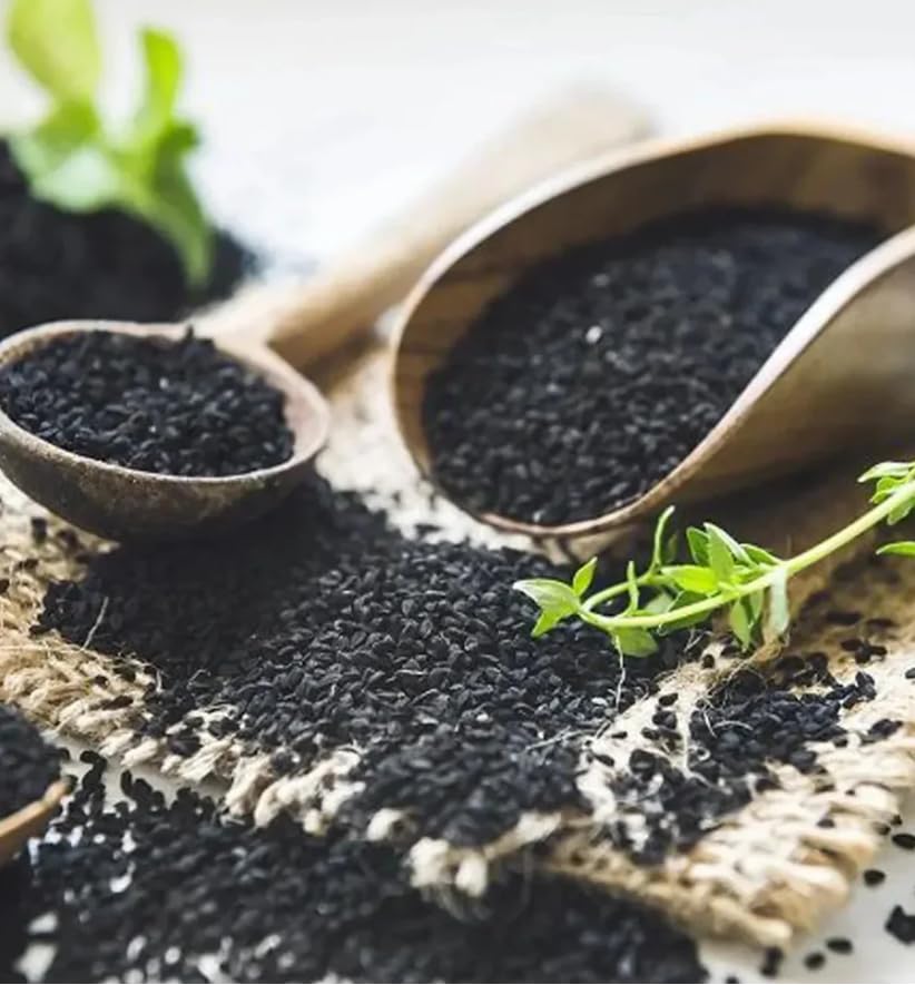 Zatik Black Seed Oil Vegan Softgels with a measuring spoon