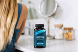 Zeal Naturals Biotin 10000MCG softgels in a lifestyle setting