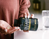 Zeal Naturals Multi Collagen Peptides 180 Capsules with a glass of water