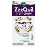 ZzzQuil Complete Sleep Capsules with a nightstand background